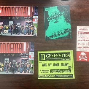 May include: Four flyers advertising events. The top left flyer is for a band called "Continental". The top right flyer is for a band called "D Generation". The bottom left flyer is for a band called "Continental". The bottom right flyer is for a band called "Sylvain Sylvain".