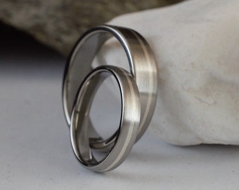 Titanium wedding band set with sterling silver inlay