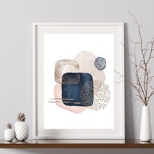 May include: Abstract art print featuring a white background with overlapping shapes in shades of pink, blue, and gold. The shapes are textured with small dots and lines.