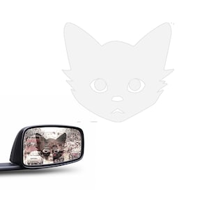 May include: A rearview mirror with a cat sticker on the glass. The cat sticker is a cartoon of a cat with big eyes and a pink nose.