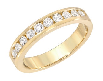Vigselring i 14 karat guld med kanalfattad diamant, 0,50 karat jubileumsring
