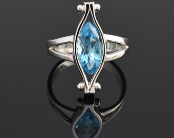 Marquise Blue Topaz Ring, 10K Gold Open Concept Design