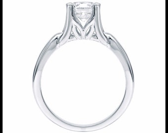 May include: A solitaire engagement ring with a large, clear diamond set in a polished, silver-colored band. The ring's setting features a unique design with decorative elements that cradle the diamond, creating a classic and elegant look.