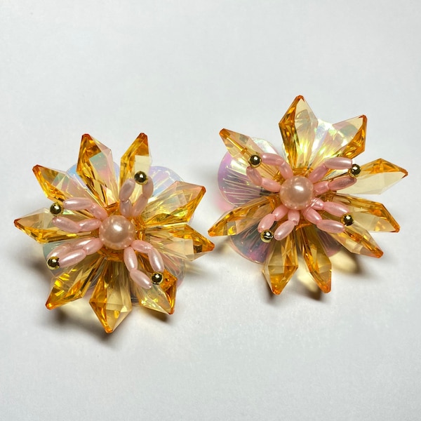 Ear clips iridescent flowers 1990s plastic luminous orange transparent vintage beads France jewelry pittsbroc sequins