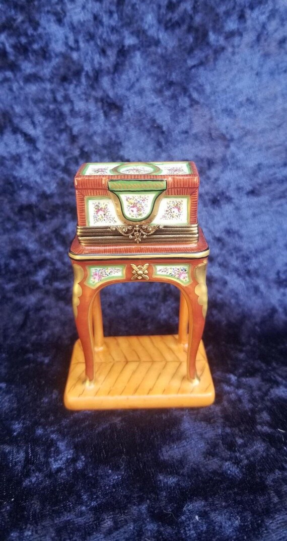 Dumont's hand-painted porcelain box bedside furnit