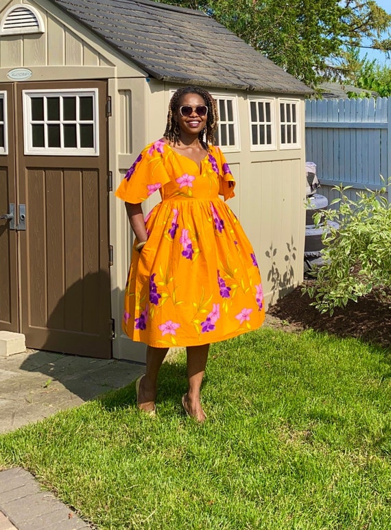 Orange fit and flare dress online