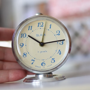 Rare Working alarm clock=Vintage table clock//Mechanical clock//Desk alarm clock Slava/Old Soviet alarm clock/made in USSR un 1970s.