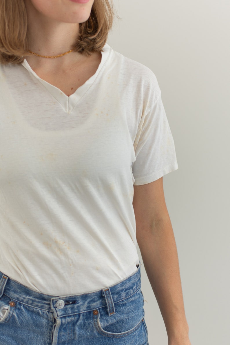 holes in cotton tee shirts