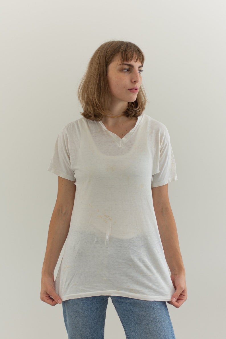 t shirt with holes in it