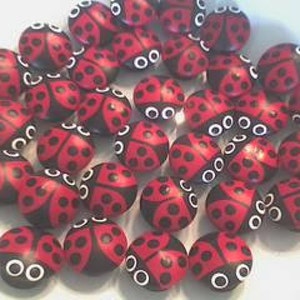 2 in.   or     1.5 in Ladybug knobs (Shown) and pulls for dresser drawers and cabinets. Perfect for the bedroom, playroom, office or kitchen