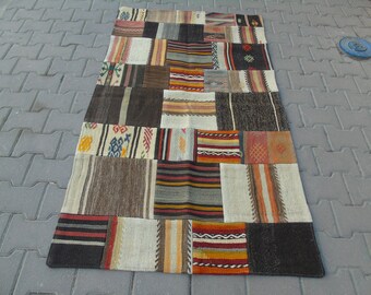 Dywan vintage z tureckiego kilimu w stylu patchworkowym: dywan wełniany boho (90x170 cm)