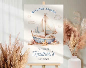May include: Watercolor baby shower sign with a nautical theme. The sign says "Welcome Aboard" and "To Celebrate Heather's Baby Shower". The sign features a blue sailboat, seashells, and starfish. The sign is displayed on a wooden easel.