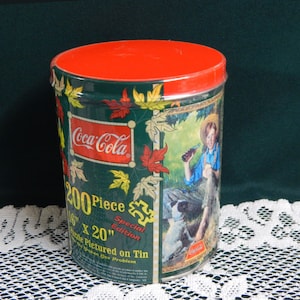 Sealed Coca-Cola Puzzle - 200 Pieces - Coca-Cola 1998 Special Edition Norman Rockwell Painting "The Barefoot Boy" in Sealed Coca-Cola Tin-