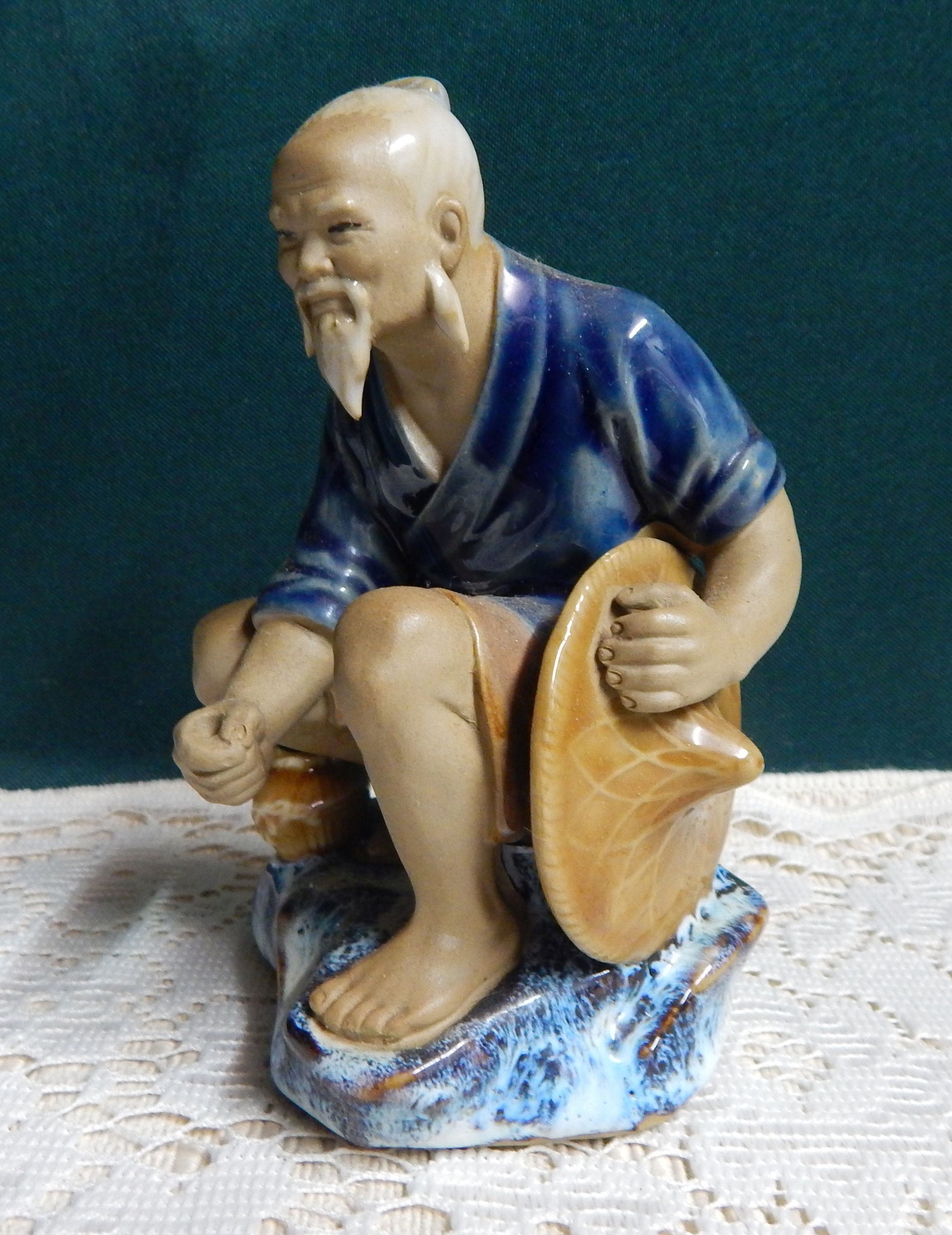 Fishing Man Figurine 