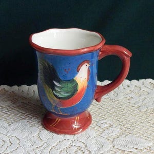Certified International 12Oz Patchwork Rooster Blue Mug Designed by Susan Winget