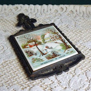 Enesco 9.25" Cast Iron The Homestead In Winter Homestead Ceramic Trivet