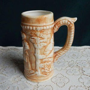 Vintage German Beer Tankard: Embossed Ceramic Barware, West Germany