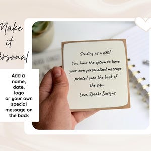 May include: A square sign with a cream-colored center and a brown border. The text reads: Sending as a gift? You have the option to have your own personalized message printed onto the back of the sign. Love, Speake Designs. Additional text reads: Make it Personal. Add a name, date, logo or your own special message on the back.