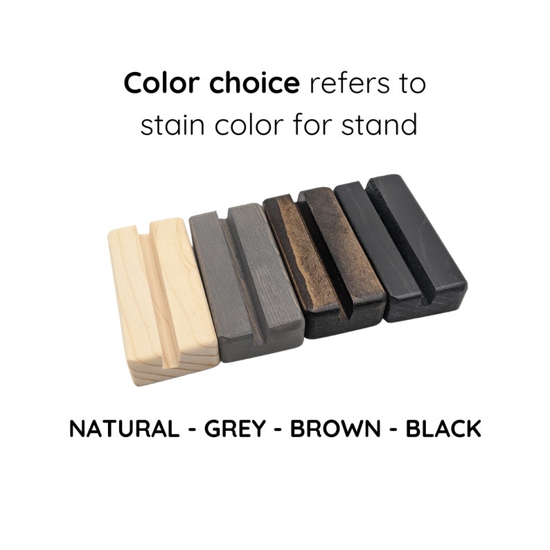 May include: Four wooden stands in natural, gray, brown, and black stain colors. "Color choice refers to stain color for stand" and "NATURAL - GREY - BROWN - BLACK" are written below the stands.