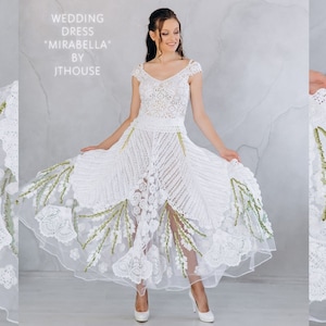 Wedding Crochet Dress “Mirabella” With Straps and Short Sleeves. Corset with a tie at the back. Skirt combines crochet and transparent tulle