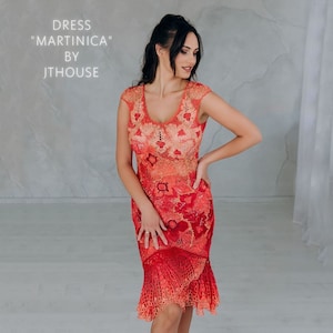 May include: A red crochet dress with a floral pattern. The dress has a fitted bodice and a flared skirt. The dress is called "Martinica" by Jthouse.