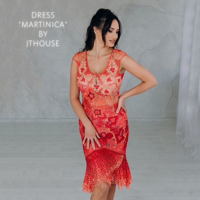 May include: A red crochet dress with a floral pattern. The dress has a fitted bodice and a flared skirt. The dress is called "Martinica" by Jthouse.
