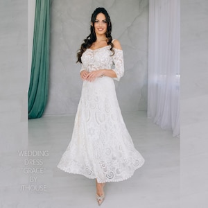 Ivory A-Line Irish Lace Crochet Wedding Dress with 3/4 Length Sleeves and Top-Quality Silk Yarn - Handcrafted Elegance for Your Special Day.