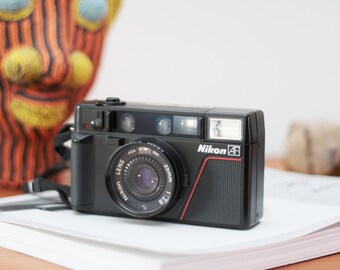 Vintage Nikon L35 AF Compact Camera with Original lens and filter