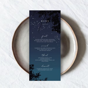 May include: A blue and white menu card with a starry night sky background and a silhouette of trees. The menu features a three-course meal with a dessert option. The menu items include braised boneless beef short ribs, parmesan and herb crusted salmon, artichoke ravioli atop sauteed spinach, and flourless chocolate torte.