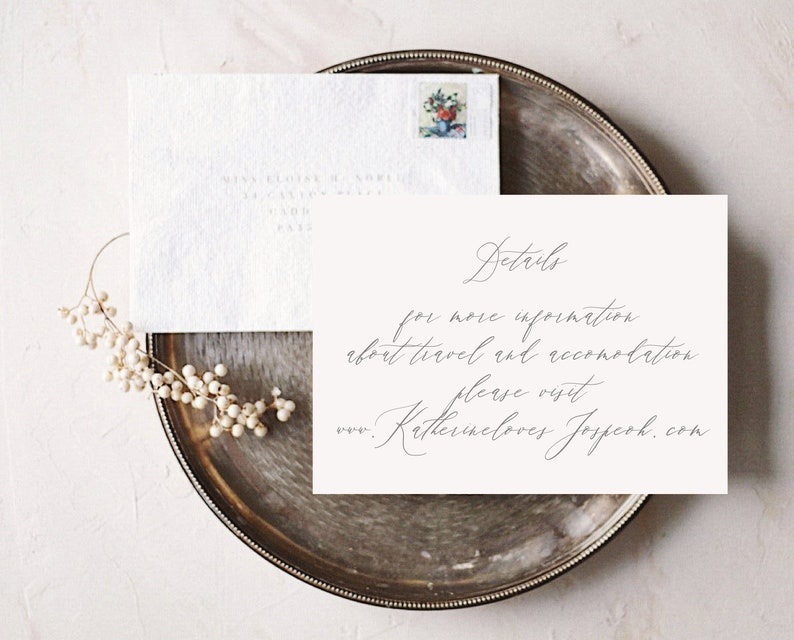 May include: A white card with the text "Details" in cursive script. The card says "For more information about travel and accommodation please visit www.katherinelovesjoseph.com".