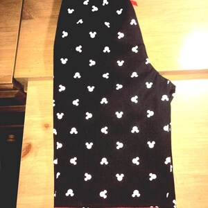Minnie Mouse Capri pant /long pant for toddler with red ruffle detail at hem. Black, white n red. Size 3T-4T. twill fabric. Disney vacation
