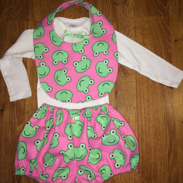Snuggle soft  flannel baby girl 3 piece set .Pink with green frogs and oh so cute. Long  sleeve onesie paired with bib and diaper cover