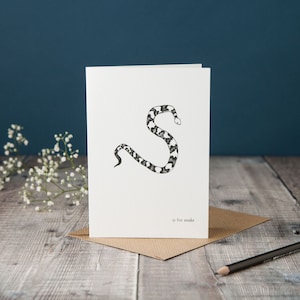 S is for Snake! typographic snake card, monochrome black and white card, pen and ink illustration