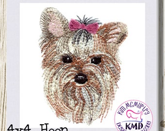 Könnte beinhalten: Stickdatei eines Yorkshire Terrier Welpen mit einer rosa Schleife. Das Design ist für einen 4x4-Hoop und stammt von Kim McMurtry Designs & Digitizing.