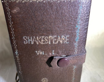 Caja de música del libro de Shakespeare