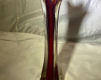 Vase pivotant rouge