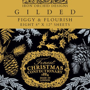 May include: Gilded decorative sheets with a figgy and flourish design. The package includes eight sheets, each measuring 20cm x 30cm. The design features a gold and silver color scheme with botanical and holiday-themed illustrations, including a wreath and pinecones.