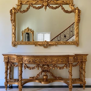 Palatial Italian 19th century Louis XVI style carved and gilt wood grand console with mirror