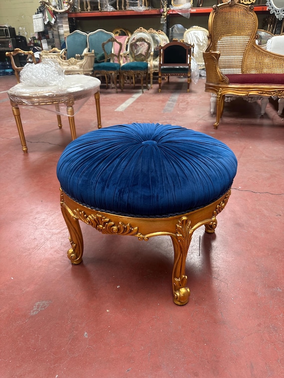 Hand carved ottoman with pleated velvet