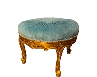 Hand carved ottoman with pleated velvet