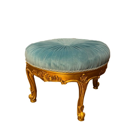 Hand carved ottoman with pleated velvet