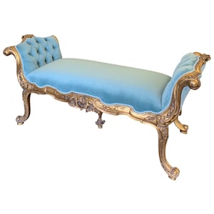 French Louis XV style Settee with ornate hand carvings and tufted seat