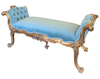 French Louis XV style Settee with ornate hand carvings and tufted seat