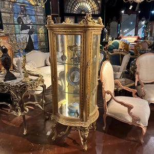 Victorian style gold cylinder display cabinet