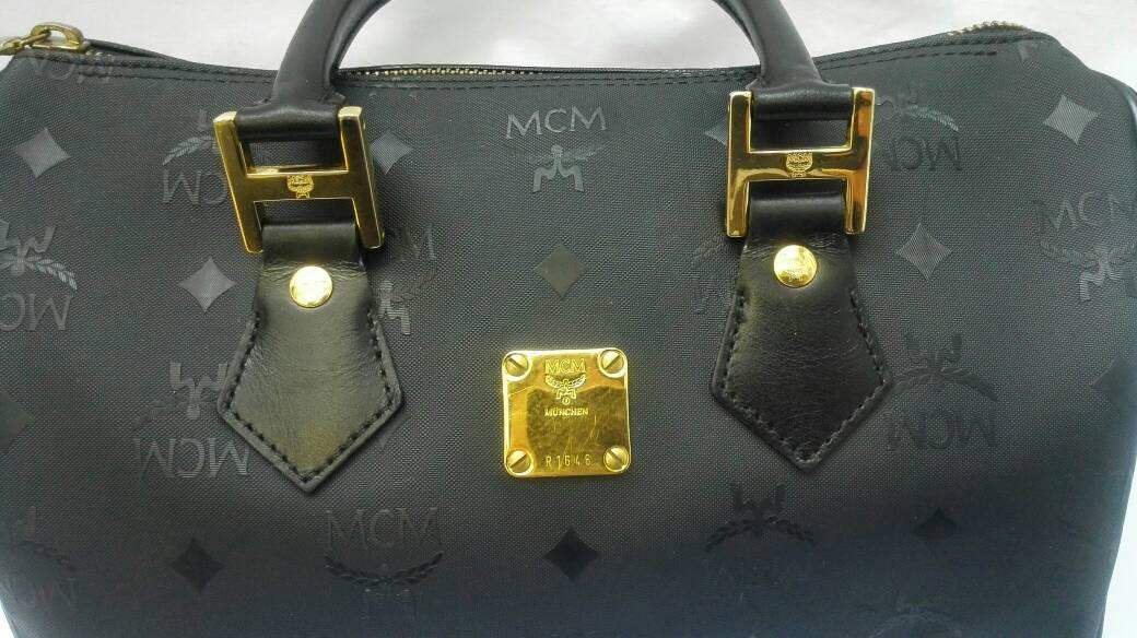 Vintage MCM black bolide style bag with gold tone metal studded charms –  eNdApPi ***where you can find your favorite designer  vintages..authentic, affordable, and lovable.