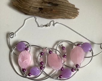 Big bold designer pink and lilac beaded twisted wire necklace.