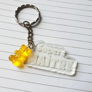 Transparante plexi sleutelhanger en Super master teddybeer