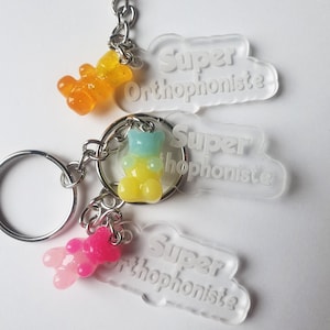 Transparante plexi-sleutelhanger en Super Logopedist-teddybeer