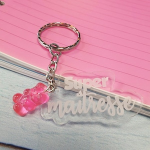 Transparante plexi sleutelhanger en Super meesteres teddybeer