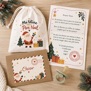 May include: A cream-colored drawstring pouch with a Santa Claus graphic and the text Ma tétine pour le Père Noël, a letter addressed to Oscar, a brown envelope with a personalized label, and a light green pacifier with a silicone nipple.